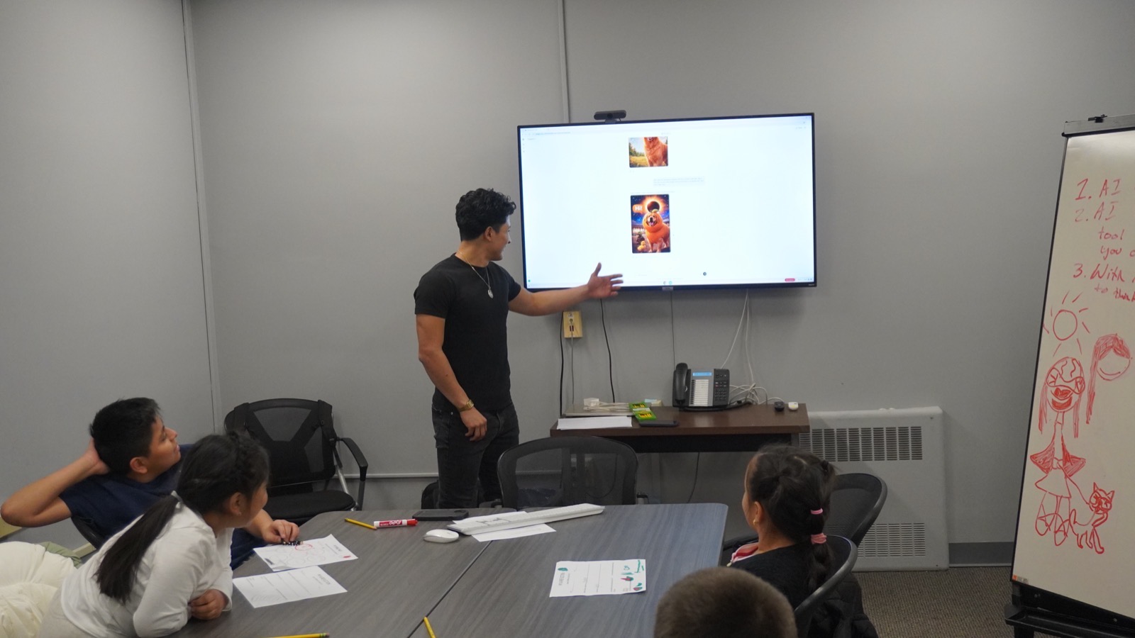 Brayan teaching students to prompt with AI